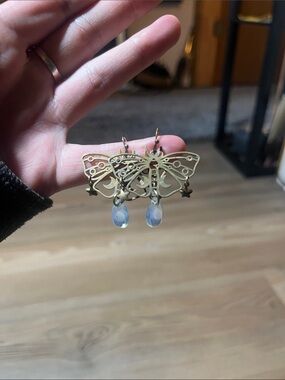 Brass Butterfly Drop Earrings with Blue Teardrop Gem